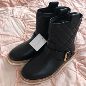 Burberry Kids black leather weather boot.